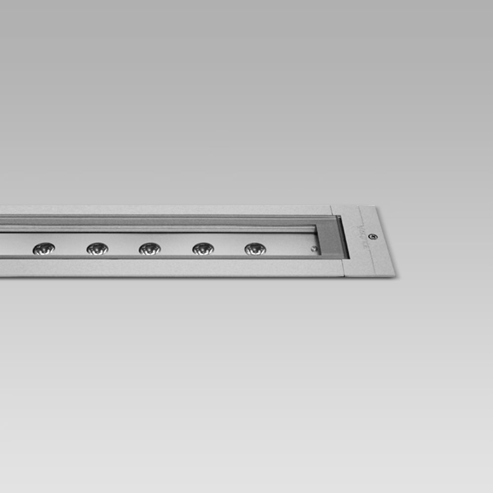 Recessed floor luminaires  In-ground recessed luminaire with a linear design, for in-line installations, with many possible light beams and effects