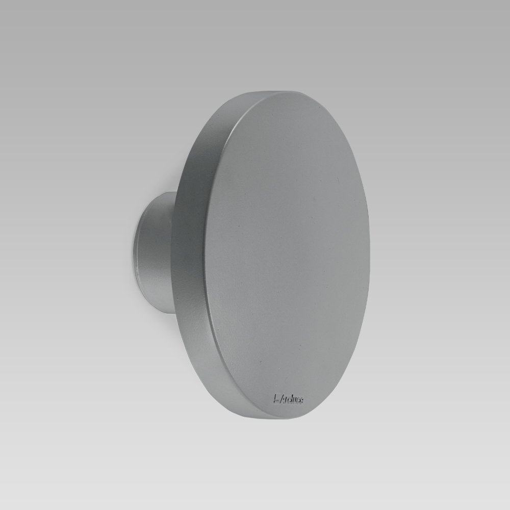 Wall-mounted luminaire for facade lighting with sophisticated design and radial optic, for a diffused and elegant lighting