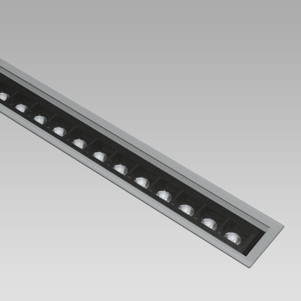 Encastrés de sol Linear in-ground luminaire with high performance and a wide range of light beams to create scenographic light effects and suggestive luminous patha